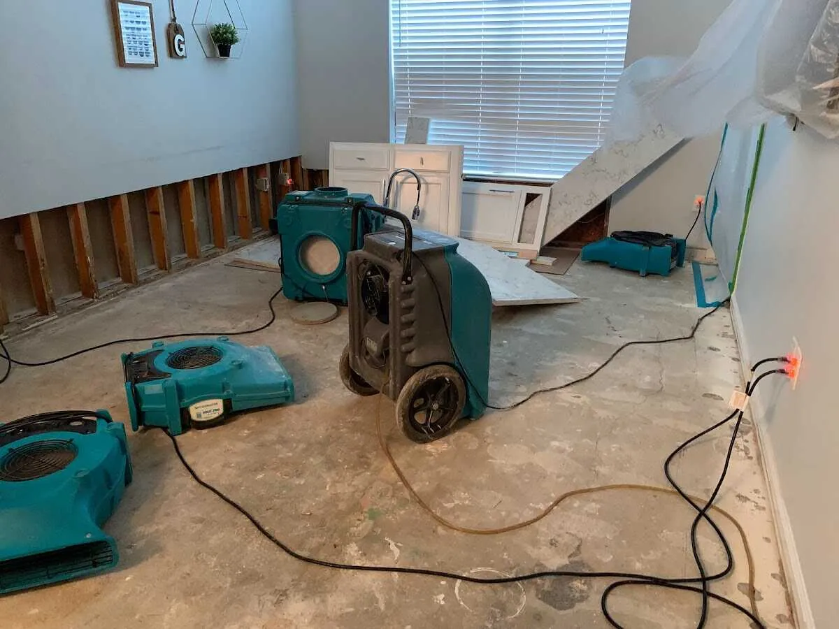 Dehumidifier in flood-cut room for Water Damage Restoration in Chantilly